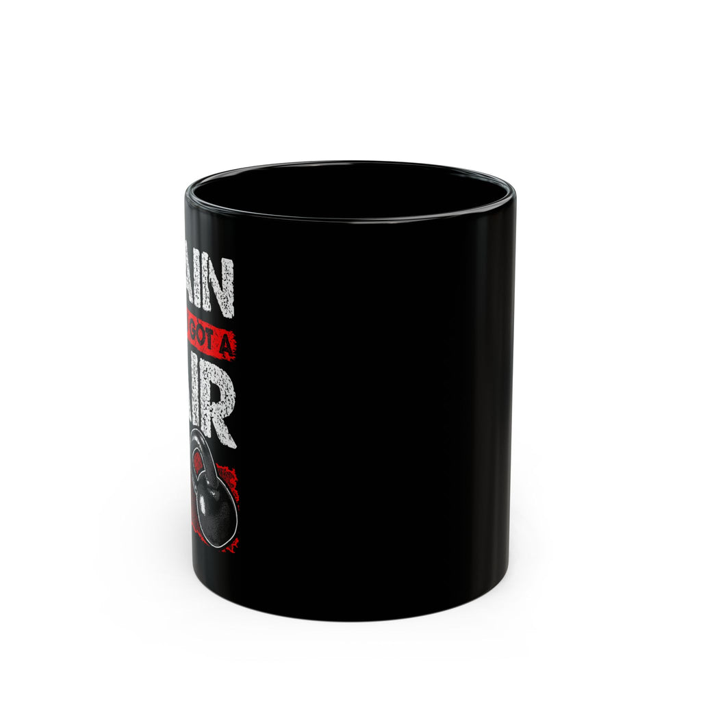 Black mug with text and graphics on a white background